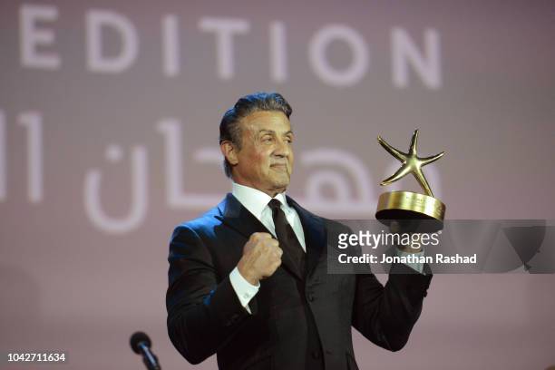 American actor Sylvester Stallone receives an honorary Career Achievement award at the closing ceremony of the 2nd El Gouna Film Festival on...