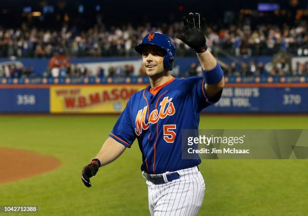 David Wright of the New York Mets waves to the crowd after grounding out as a pinch hitter during the fifth inning against the Miami Marlins at Citi...