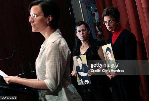 Recently-released hiker Sarah Shourd gives a statement while mothers of still-imprisoned hikers Cindy Hickey , and Laura Fattal look on holding...