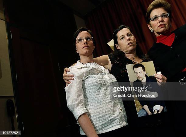 Recently-released hiker Sarah Shourd stands with the mothers of two still-imprisoned hikers, Cindy Hickey , and Laura Fattal after a press conference...