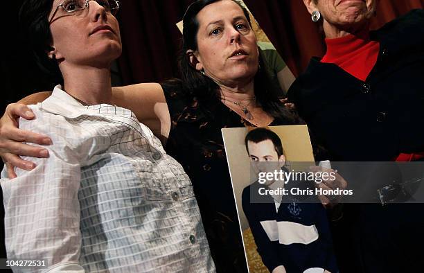 Recently-released hiker Sarah Shourd stands with the mothers of two still-imprisoned hikers, Cindy Hickey , and Laura Fattal after a press conference...