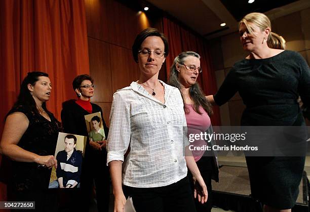 Recently-released hiker Sarah Shourd walks with her mother Nora Shourd while the mothers of two still-imprisoned hikers, Cindy Hickey , and Laura...