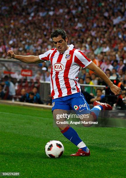 Antonio Lopez of Atletico Madrid in action during the La Liga match between Atletico Madrid and Barcelona at Vicente Calderon Stadium on September...