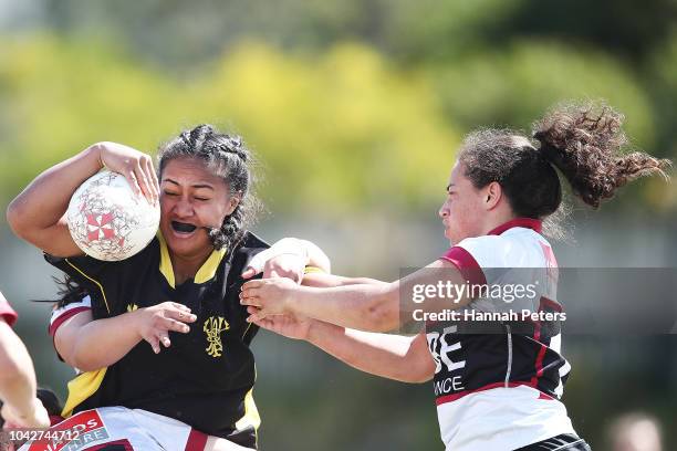 Monica Tagoai of Wellington charges forward during the round five Farah Palmer Cup match between North Harbour Hibiscus and Wellington Pride at...