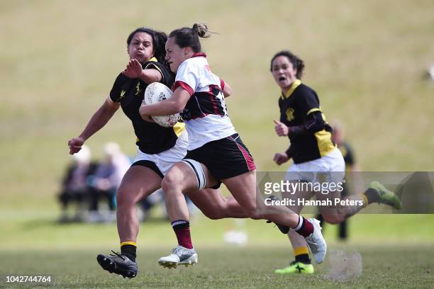 Stacey Tupe of North Harbour makes a break during the round five Farah Palmer Cup match between North Harbour Hibiscus and Wellington Pride at...