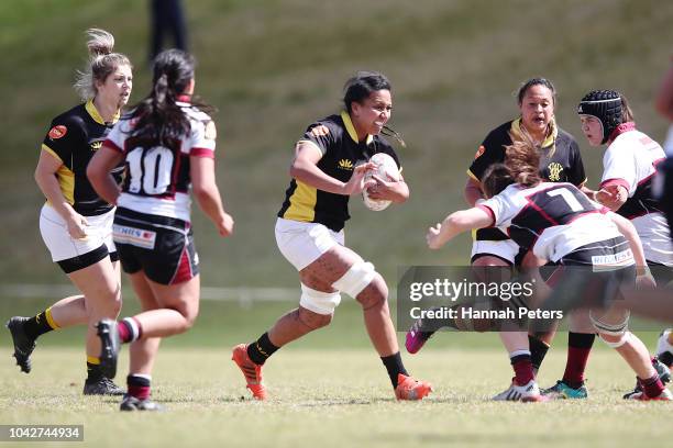 Sanita Levave of Wellington makes a break during the round five Farah Palmer Cup match between North Harbour Hibiscus and Wellington Pride at Windsor...
