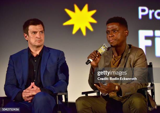 Nathan Fillion and Mpho Koaho speak onstage during the Closing Night Screening of "Nomis" during the 2018 LA Film Festival at ArcLight Cinerama Dome...