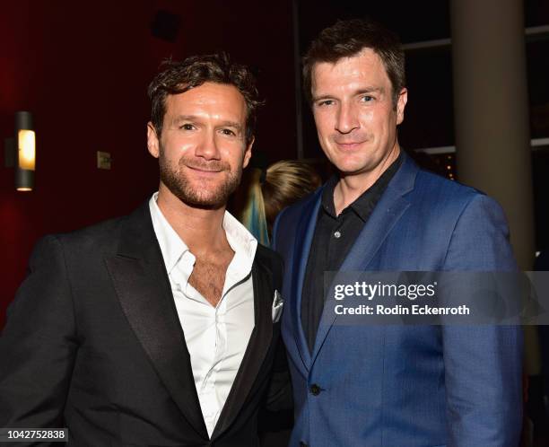 David Raymond and Nathan Fillion attend the Closing Night Reception during the 2018 LA Film Festival at ArcLight Hollywood on September 28, 2018 in...