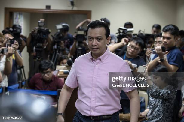 Philippine senator Antonio Trillanes leaves the senate building after a press conference in Manila on September 29, 2018. - Lawmaker Trillanes,...