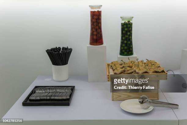 Fruit jars and chicken snacks are displayed at a buffet at the Annual Meeting of the New Champions of the World Economic Forum held in Tianjin from...