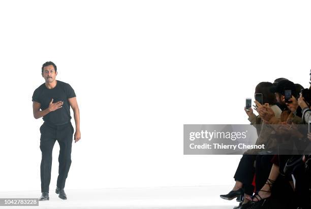 Fashion designer Haider Ackermann acknowledges the audience at the end the Haider Ackermann show as part of the Paris Fashion Week Womenswear...