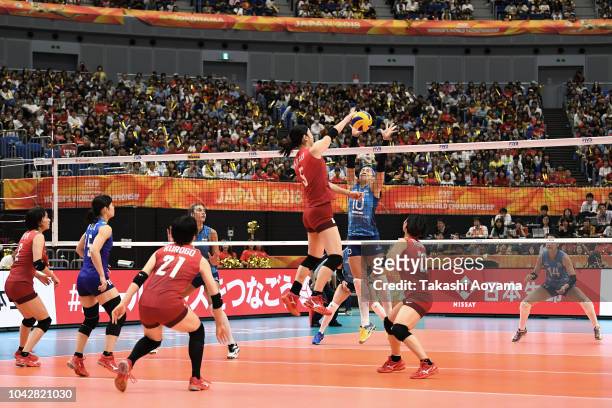 Erika Araki of Japan spikes the ball during the Group A match between Japan and Argentina on day one of the FIVB Women's World Championship at...