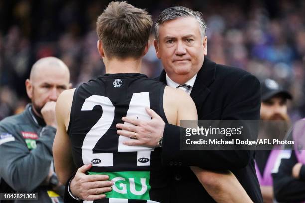 Collingwood president Eddie McGuire hugs Josh Thomas of the Magpies after their loss during the 2018 AFL Grand Final match between the Collingwood...