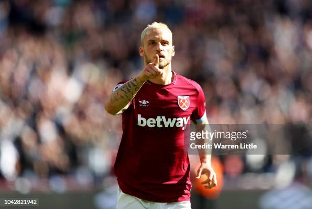 Marko Arnautovic of West Ham United celebrates scoring his sides third goal during the Premier League match between West Ham United and Manchester...