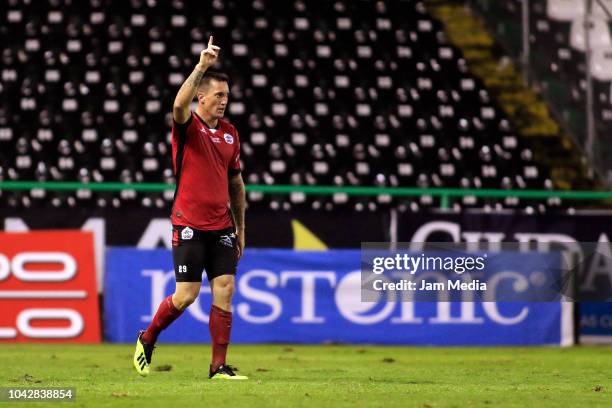 Leonardo Ramos of Lobos BUAP celebrates after scoring the first goal of his team during the 10th round match between Leon and Lobos BUAP as part of...