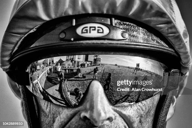 Reflection in the goggles of Gerald Mosse at Newmarket Racecourse on September 29, 2018 in Newmarket, United Kingdom.