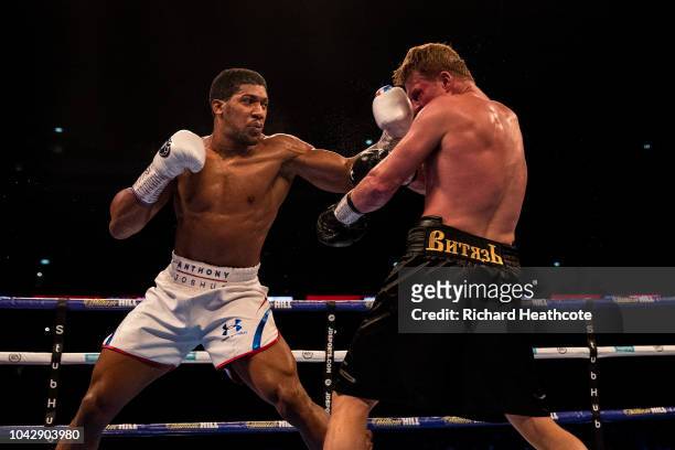 Anthony Joshua and Alexander Povetkin trade punches during the IBF, WBA Super, WBO & IBO World Heavyweight Championship title fight between Anthony...