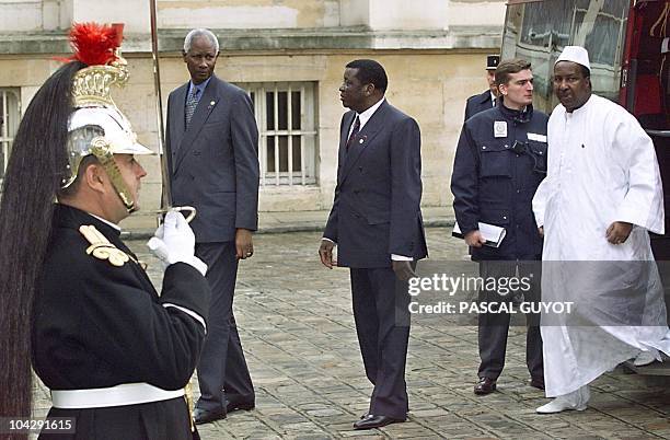 Senegalese President Abdou Diouf , Togolese President Gnassingbe Eyadema and Malian President Alpha Oumar Konare arrive at the Hotel de Lassay for a...