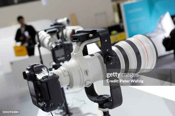 Canons super telephoto lenses in the lineup are dispayed during the press preview of the Photokina 2010 trade fair on September 20, 2010 in Cologne,...