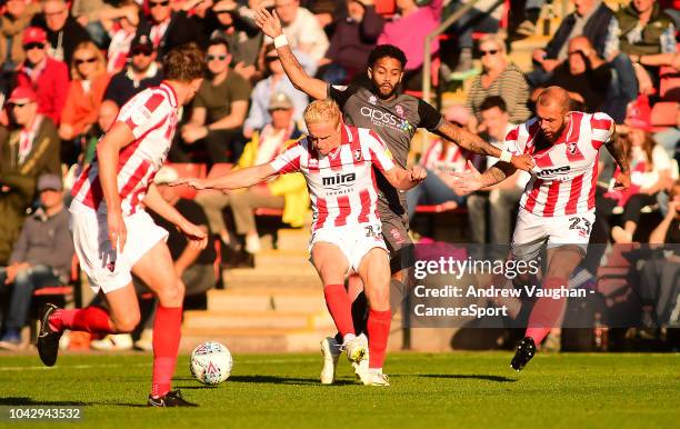 Lincoln City's Bruno Andrade vies for possession with Cheltenham Town's Ryan Broom during the Sky Bet League Two match between Cheltenham Town and...