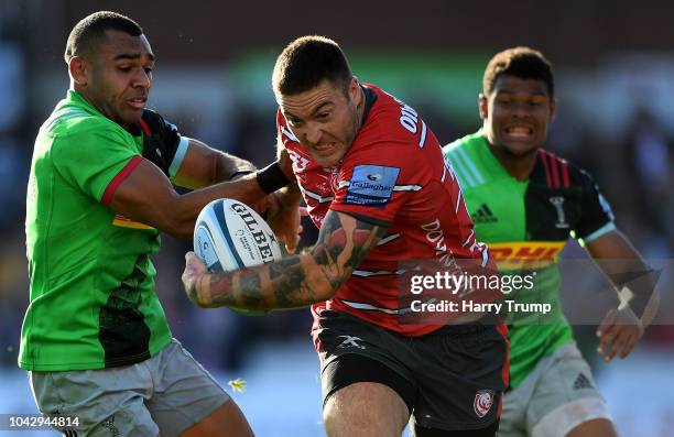 Matt Banahan of Gloucester Rugby is tackled by Joe Marchant of Harlequins during the Gallagher Premiership Rugby match between Gloucester Rugby and...