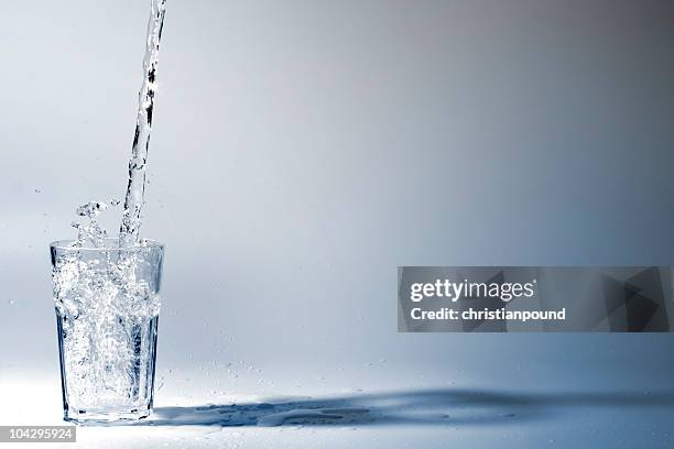 drinking water - glass water stock-fotos und bilder