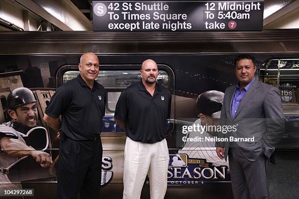 Former professional baseball players Cal Ripkin Jr., David Wells and Ron Darling attend the MLB On TBS 42nd Street Times Square shuttle unveiling at...