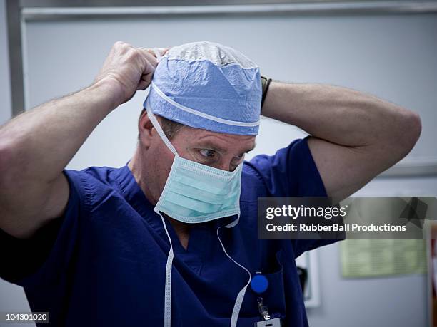 usa, utah, payson, doctor preparing for surgery - surgery preparation stock pictures, royalty-free photos & images