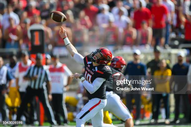 Alan Bowman of the Texas Tech Red Raiders passes the ball during the first half of the game against the West Virginia Mountaineers on September 29,...