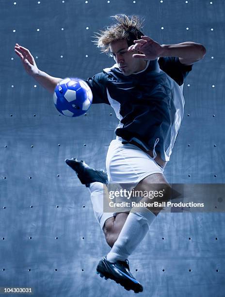 soccer player - stunt stock pictures, royalty-free photos & images