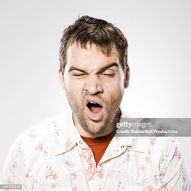 man yawning - yawning stock pictures, royalty-free photos & images