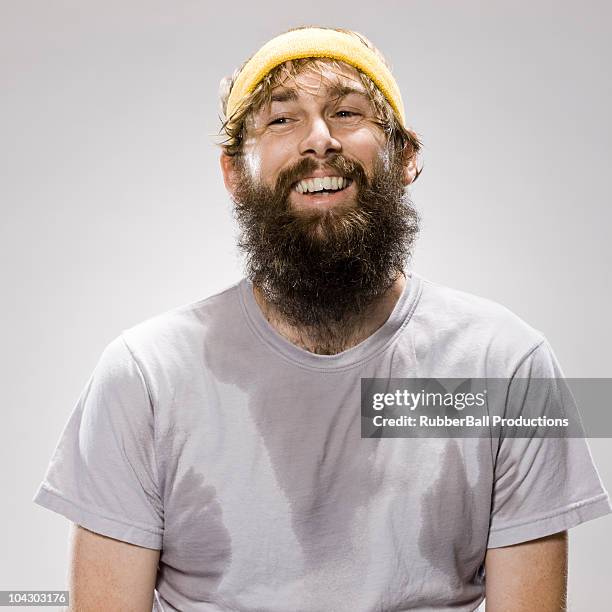 bearded man wearing a headband - fascia assorbi sudore foto e immagini stock