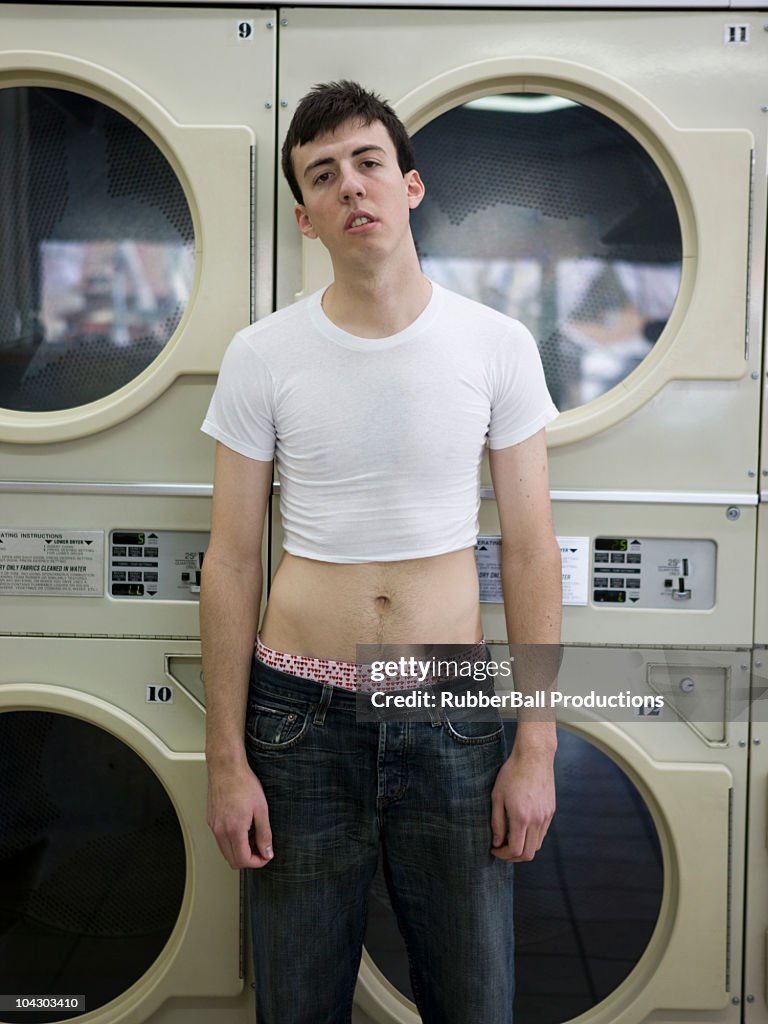 Man wearing a shrunken t-shirt
