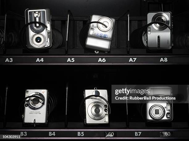 digital cameras in a vending machine - vending machine stock pictures, royalty-free photos & images