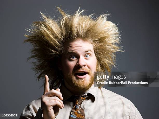 man with wild hair - hair standing on end stock pictures, royalty-free photos & images