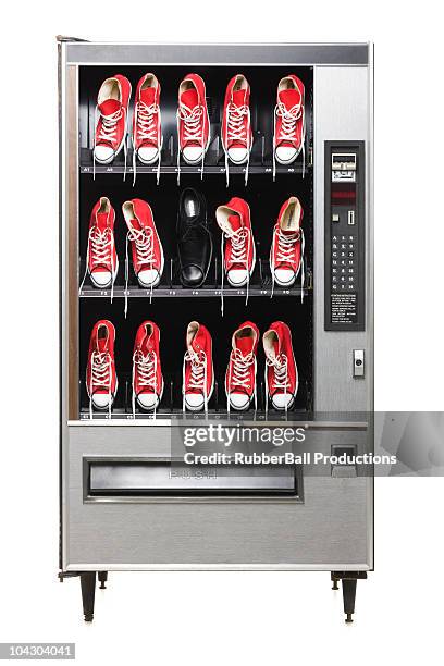 red sneakers in a vending machine - vending machine stock pictures, royalty-free photos & images