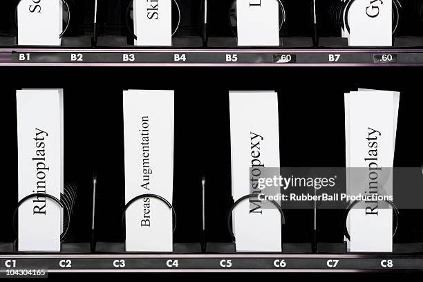 cosmetic surgery procedures in a vending machine - mastopexy stock pictures, royalty-free photos & images
