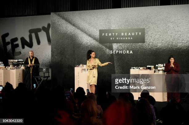 Hector Espinal, Rihanna and Priscilla Ono walk on stage during her Fenty Beauty Artistry and Beauty Talk in collaboration with Sephora, for the...