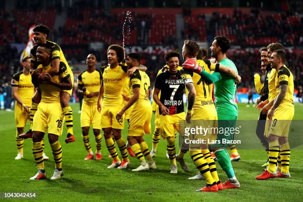 Borussia Dortmund players celebrate their 2-4 victory after the Bundesliga match between Bayer 04 Leverkusen and Borussia Dortmund at BayArena on...