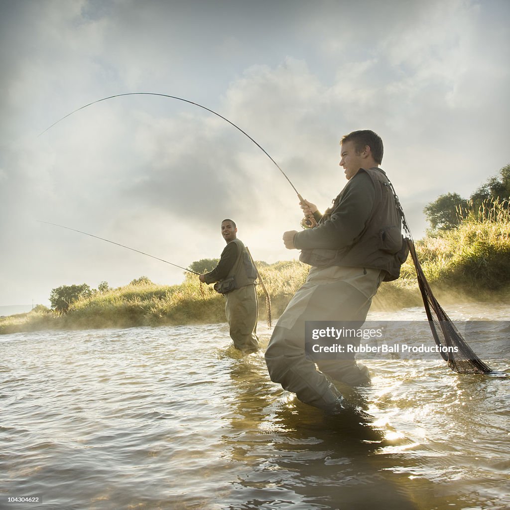 Fly fisherman fishing in a mountain river