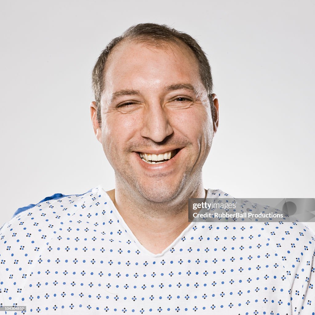 Man in a hospital gown