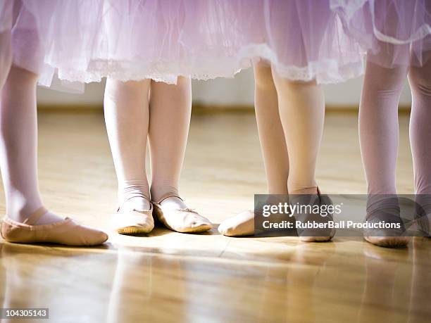 four girls (2-3,4-5) practicing in ballet studio,low section - springville utah stock pictures, royalty-free photos & images