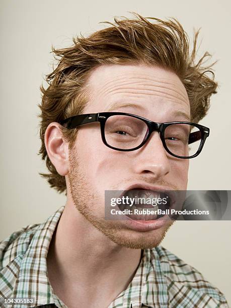 persona está soplado de viento en la cara - human face fotografías e imágenes de stock