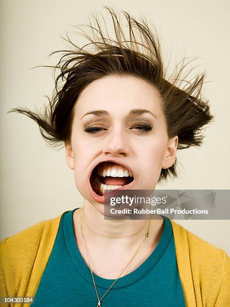 person getting wind blown in the face - face stockfoto's en -beelden