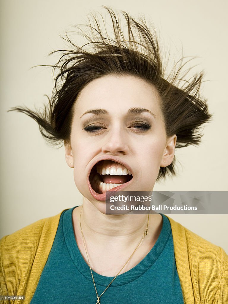 Person getting wind blown in the face