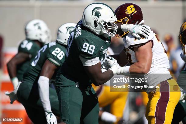 Raequan Williams of the Michigan State Spartans rushes the quarterback while playing the Central Michigan Chippewas at Spartan Stadium on September...