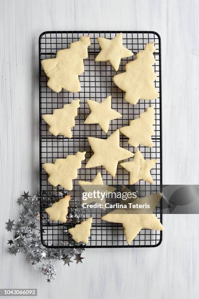 fresh baked christmas cookies on a wire rack - rack stock pictures, royalty-free photos & images