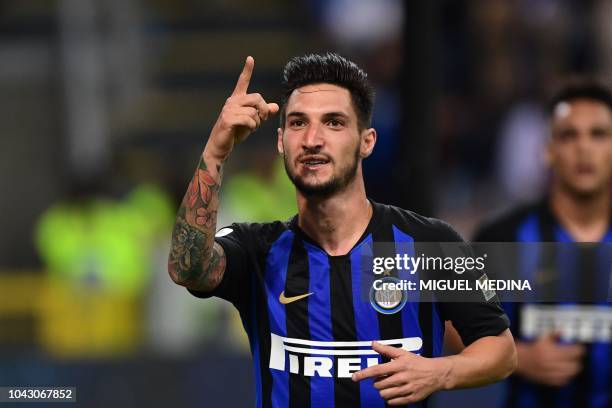 Inter Milan's Italian midfielder Matteo Politano celebrates after scoring during the Italian Serie A football match Inter Milan vs Cagliari on...