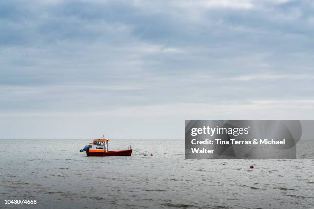 small fishing boat on the north sea - north sea fishing stock pictures, royalty-free photos & images