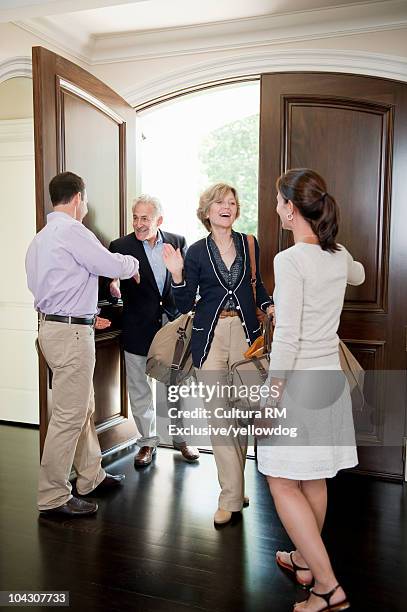 grandparents visiting adult children - father in law stock pictures, royalty-free photos & images